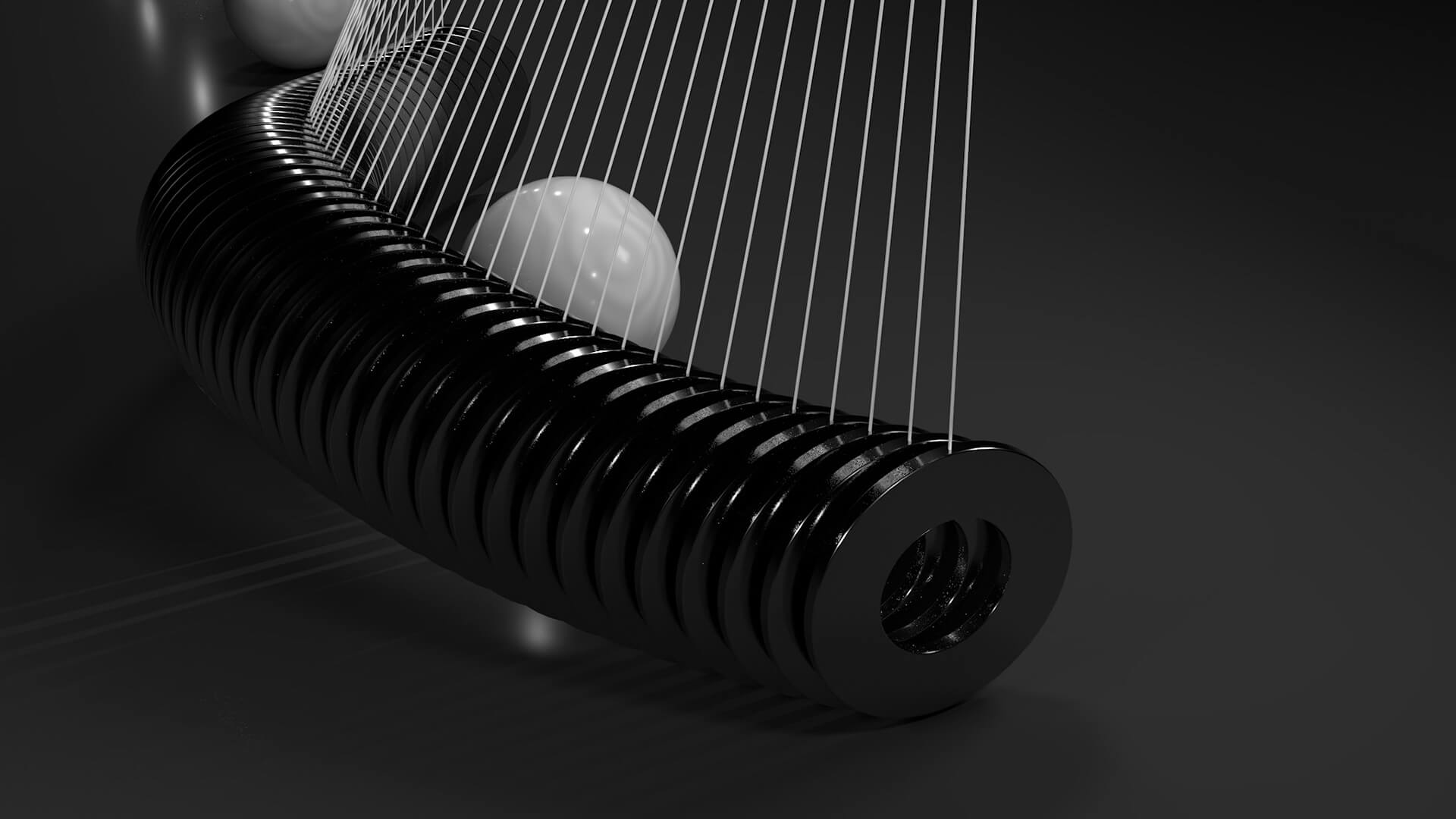 A string of hanging black cylinders next to a white ball