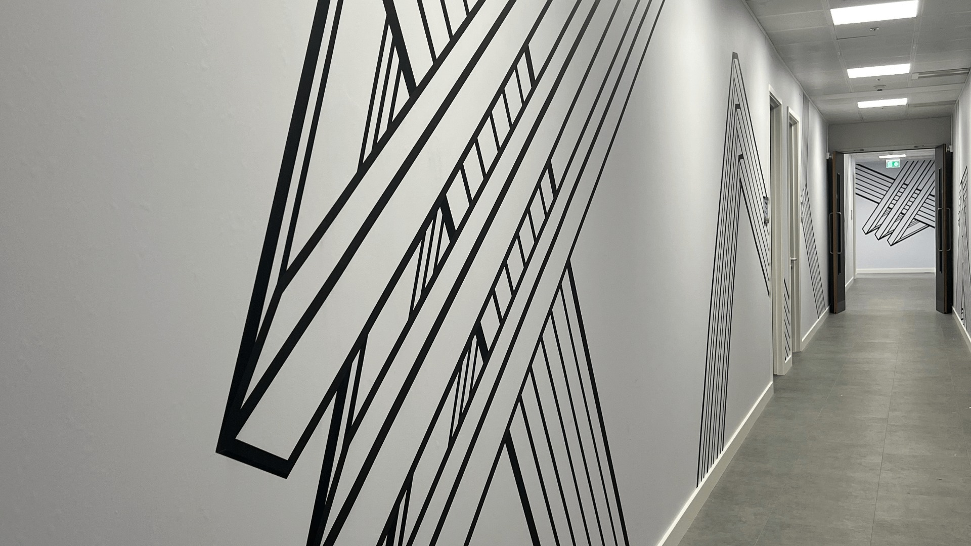 Escape Studios corridor with wall art design