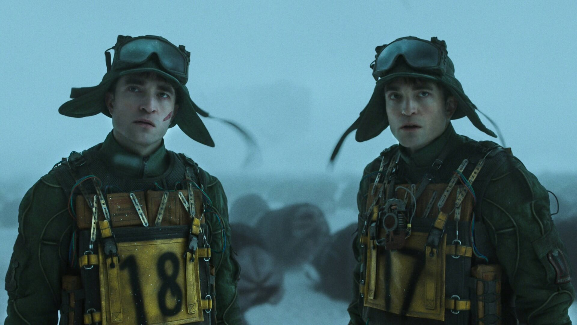 Two clones wearing identical clothes outside on ice planet