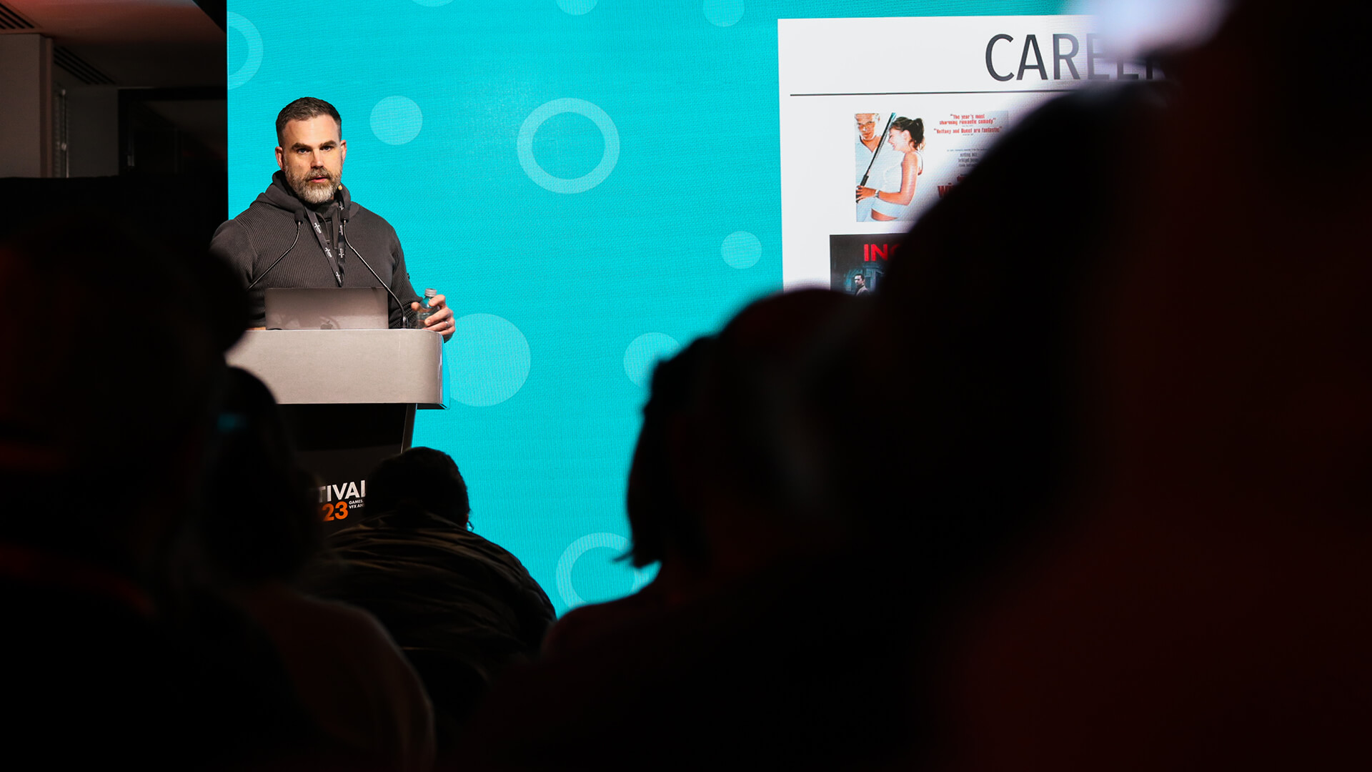 Male speaker presenting at an event